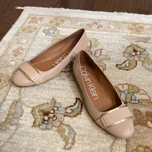 Calvin Klein dress flats in tan with gold trimmed buckle